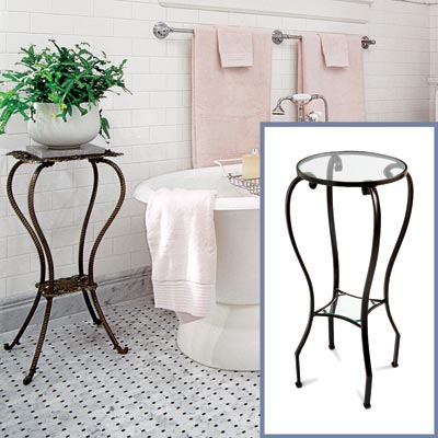 an iron-frame glass-top side table to go in a Victorian-style bathroom