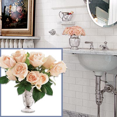 a silver vase with flowers to go in a Victorian-style bathroom