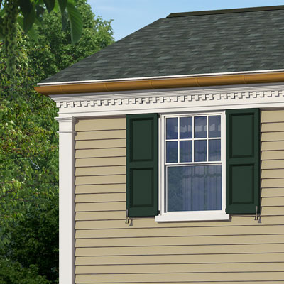 Exterior pilasters along the side of this colonial home after photoshop redo