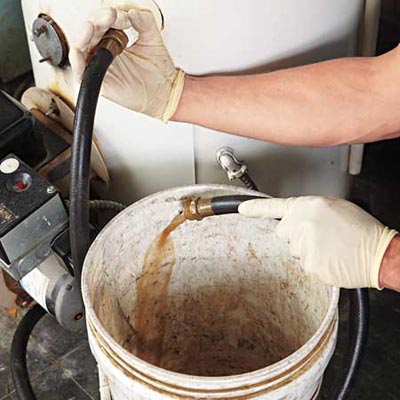 flushing a water heater to get rid of built-up sediment