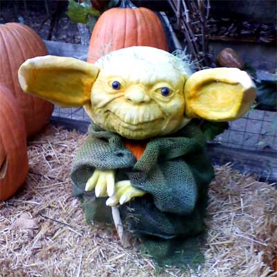 Yoda from Star Wars carved into a pumpkin
