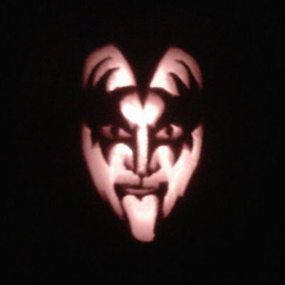 Gene Simmons in his Kiss makeup carved into a pumpkin