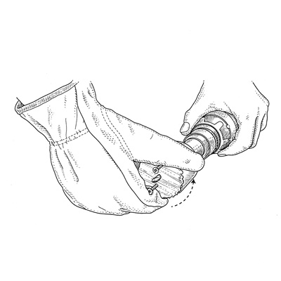 illustration of ejecting plug from hole saw