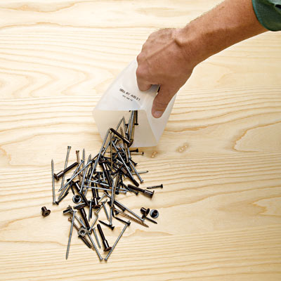 plastic milk jug used to pick up nails