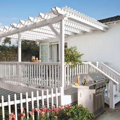 Backyard deck and patio of this bungalow after remodel