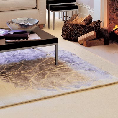 living room with big bloom area rug