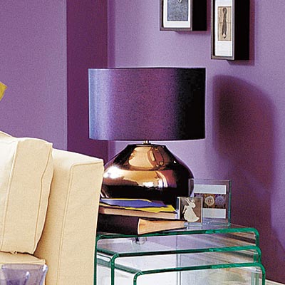 living room with metallic table lamp