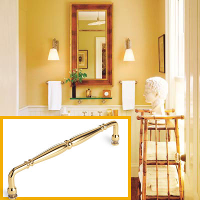 a half-bath furnished with Colonial details, towel bar inset