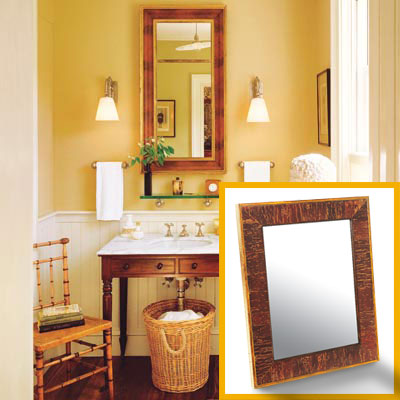 a half-bath furnished with Colonial details, mirror inset