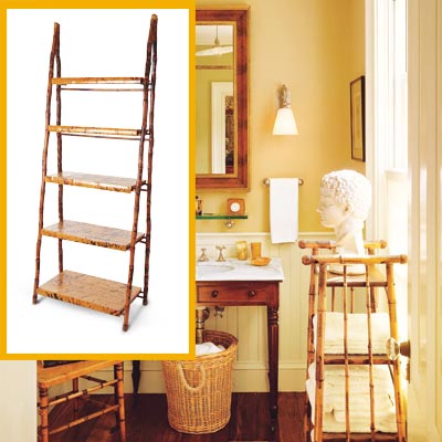 a half-bath furnished with Colonial details, free-standing shelf inset