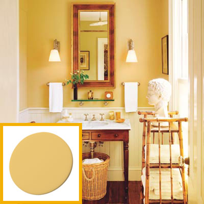 a half-bath furnished with Colonial details, yellow-ochre paint drop inset