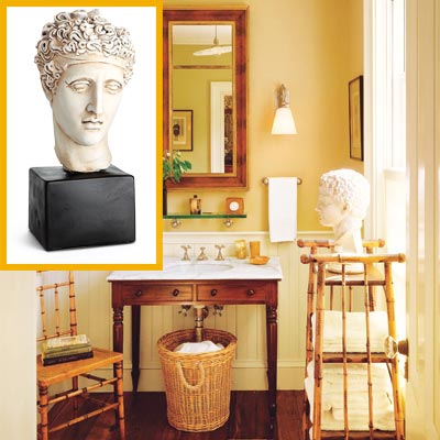 a half-bath furnished with Colonial details, reproduction of a Greek bust inset
