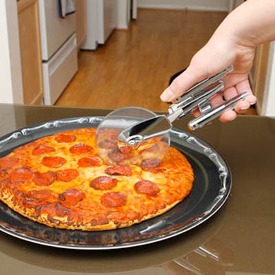 a pizza slicer shaped like the Enterprise from Star Trek