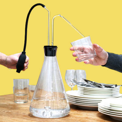 a water pitcher with a hand-squeeze pump