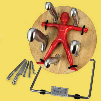 a knife rack with a small figure strapped to the middle