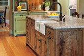 a kitchen island by Crown Point Cabinetry