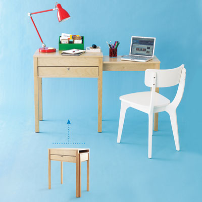 a small table with a pull-out work surface