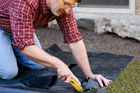 Norm Abram uses a utility knife