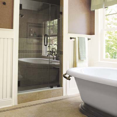 large windows and glass shower door adds light 