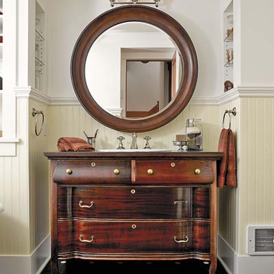 mahagony dresser in guest bathroom in remodeled houseboat