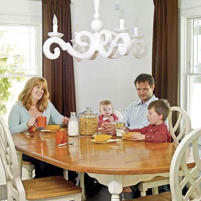 Homeowners Jennifer and Jeff Kuryluk with daughter and son at kitchen 