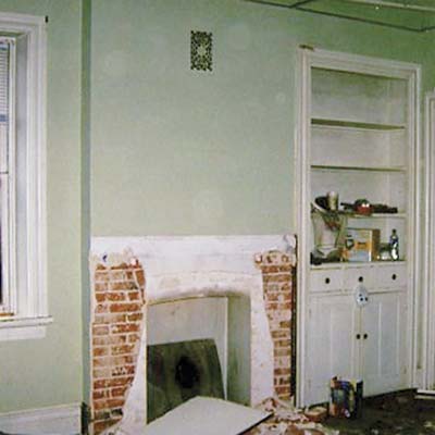 before photo of dining room with missing mantel