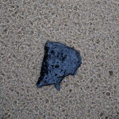 tar on the ground 