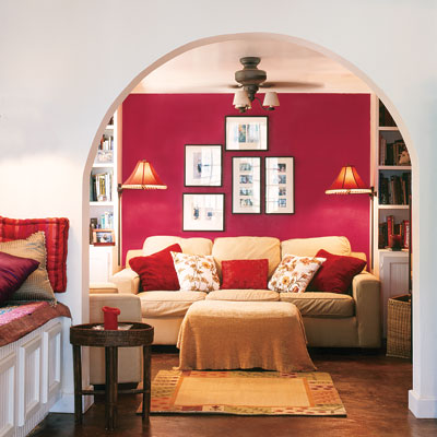 neutral-color archway showing a brightly painted wall in the room beyond