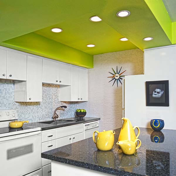 white kitchen with lime green ceiling