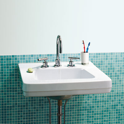 bathroom sink with blue tile