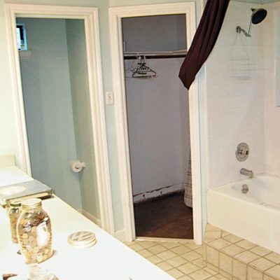 bathroom with closets before makeover 
