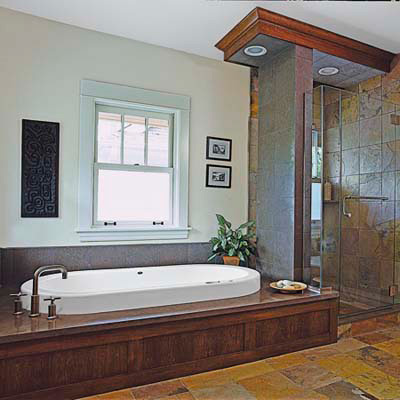 wood bath with multicolored slate tiles 