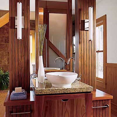 bathroom with wood vanity and mirror 