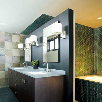 bath with wood accents and earth-toned tiles