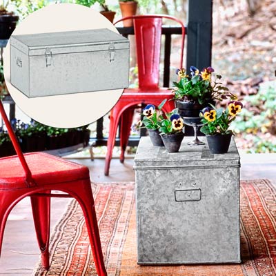 a porch with inset of galvanized metal trunk