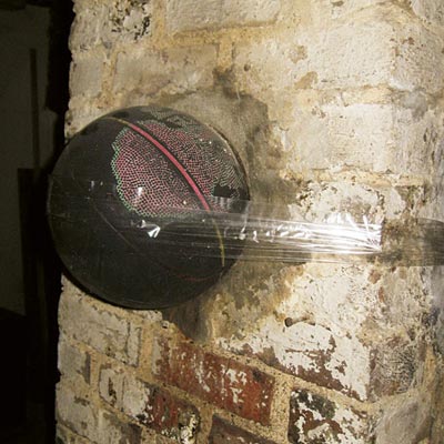 a basketball taped over a flue hole