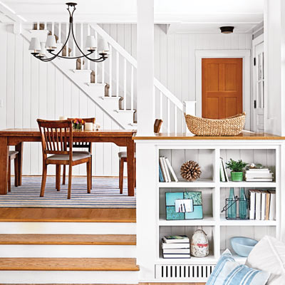 built-in bookshelf between living room and dining room