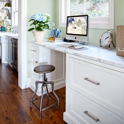 after kitchen remodel desk area with matching cabinets, countertop and window trim to rest of kitchen 