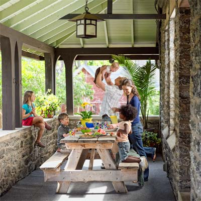 winning family on the porch of the this old house reader remodel grand prize winning house