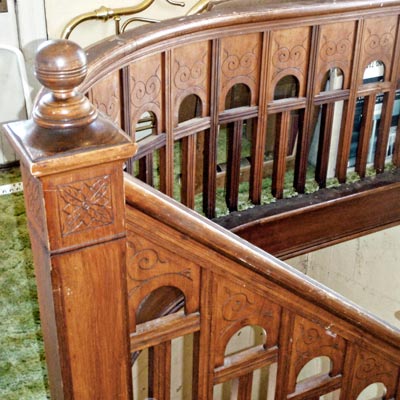 hand-carved oak staircase in Queen Anne house in Tillamook, Oregon for sale through Save This Old House