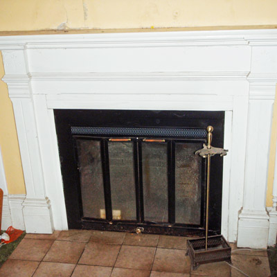 hand-carved mantel in Queen Anne house in Tillamook, Oregon for sale through Save This Old House