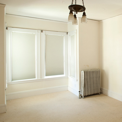 front parlor before remodel that will be turned into kitchen of TOH TV project house Cambridge