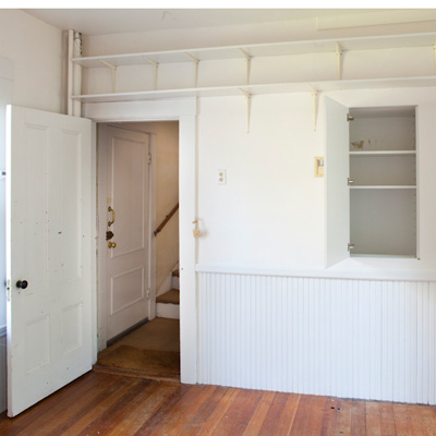 laundry room before remodel will be turned into family room of TOH TV project house Cambridge