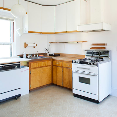 upstairs kitchen before remodel that will be turned into bedrooms and a bathroom in TOH TV project house Cambridge