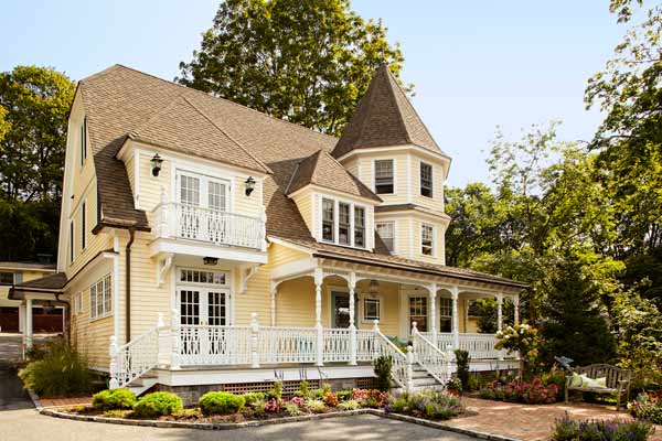 curb appeal boost on budget yellow queen anne mansion