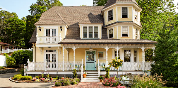 curb appeal boost on a budget yellow queen anne mansion