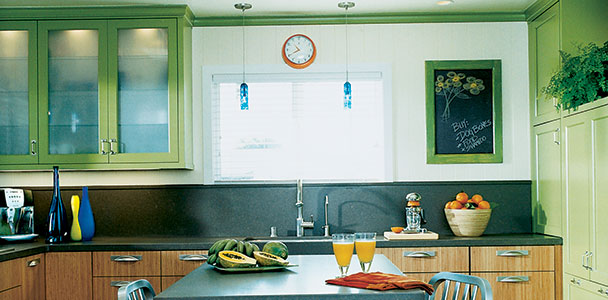 kitchen with revamped green cabinets