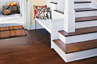 hardwood floor by a stairwell