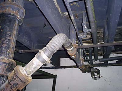 home inspection photo of Pontiac radiator hose as plumbing pipe