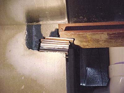 home inspection photo of improperly secured I-beam